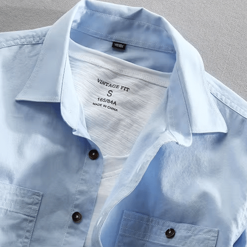 Långärmad Skjorta i 100% Bomull med Bröstfickor och Rundad Söm - STILUNA