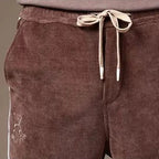 Mjuka Corduroy Sweatpants med Tri - Färgad Design och Tre Fickor - STILUNA